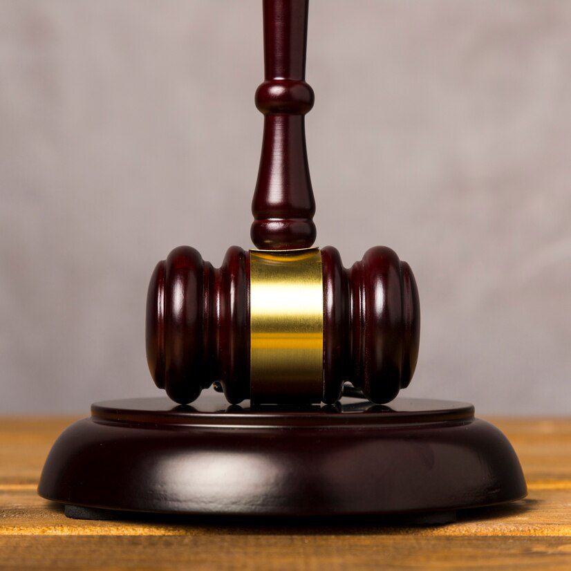 close-up-judge-gavel-with-its-striking-block_23-2148230087 close up judge gavel with its striking block