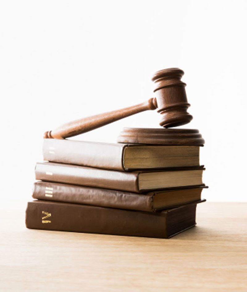 port-10 gavel with books old wooden desk
